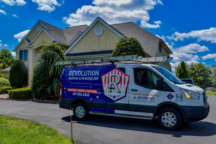 Revolution service van at a completed exterior project