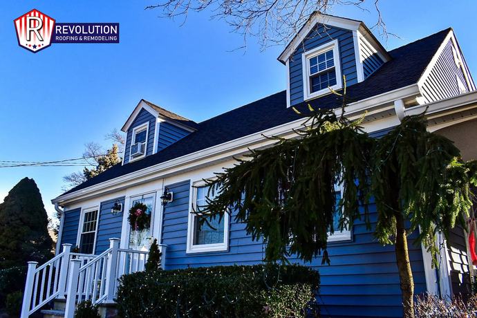 Completed blue siding installation on a New Jersey home